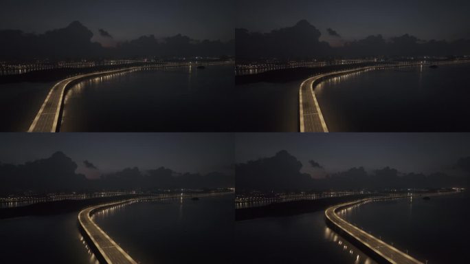 夜晚开灯后海面上的跨海大桥