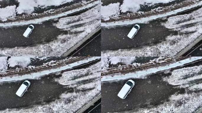 俯拍一辆白色汽车停在雪地上