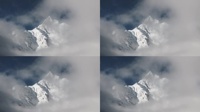 云雾间的雪山 神女峰