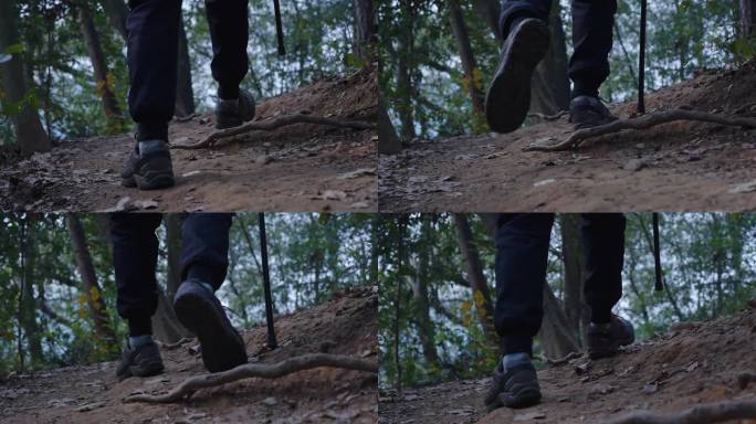 男人攀登山峰丛林山路脚步特写