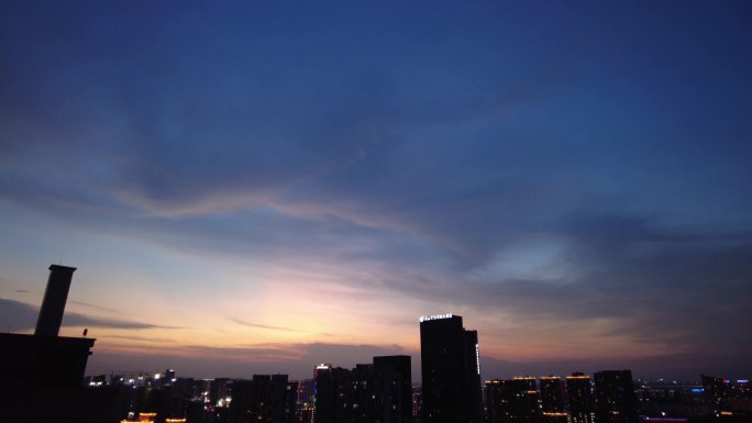 杭州下沙钱塘区城市天空日转夜延时摄影