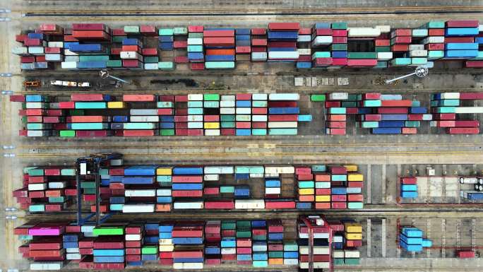 航拍城市港口物流集装箱码头堆放的货物