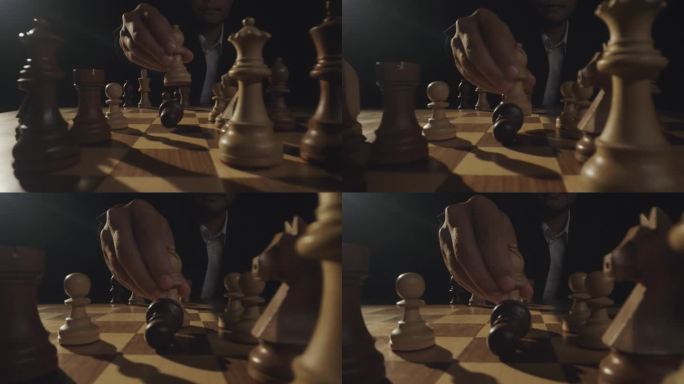 男人下国际象棋对局吃棋
