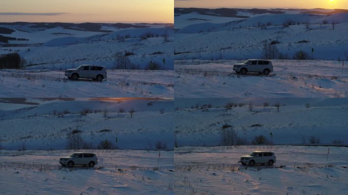 日出环绕航拍雪地下的车辆