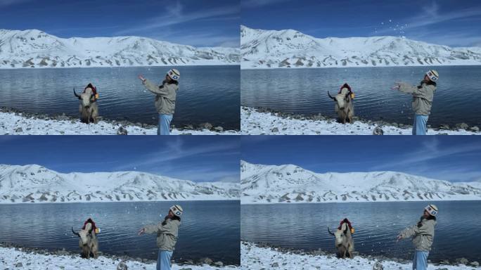 （慢镜）雪山湖泊蓝天白云美女向天空撒雪