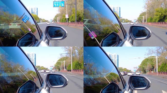 开车第一视角汽车行驶在马路上面后视镜视角