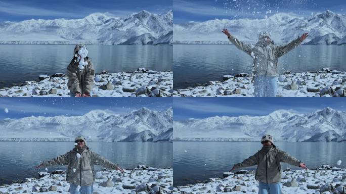 （慢镜）雪山湖泊蓝天白云美女向天空撒雪