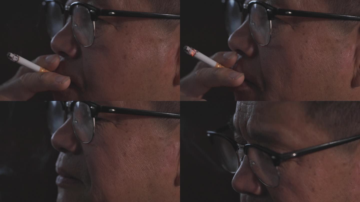 老年男人抽烟特写