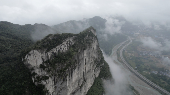 高山悬崖云间公路穿云航拍环绕长镜头