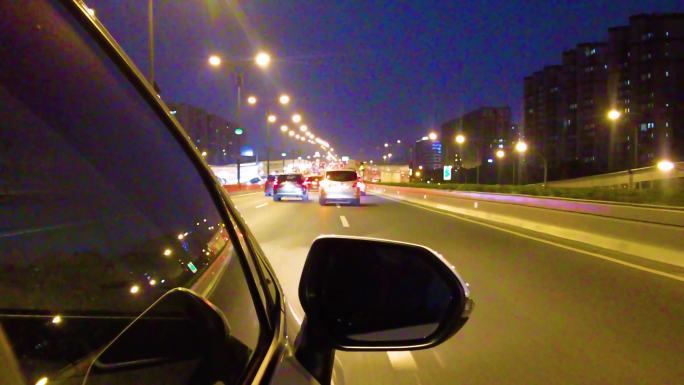 城市夜晚汽车在马路行驶夜景视频素材4