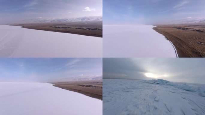 冬季青海湖结冰块冰封航拍男人坐在冰面上
