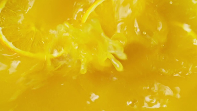 橙子掉入橙汁慢镜特写