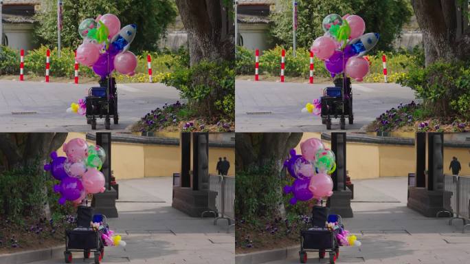 景区门口卖气球的小车