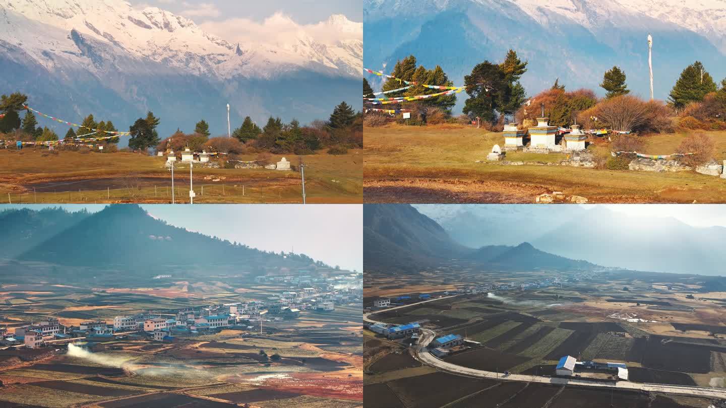 西藏吉隆镇乃夏村日出航拍雪山村庄风景