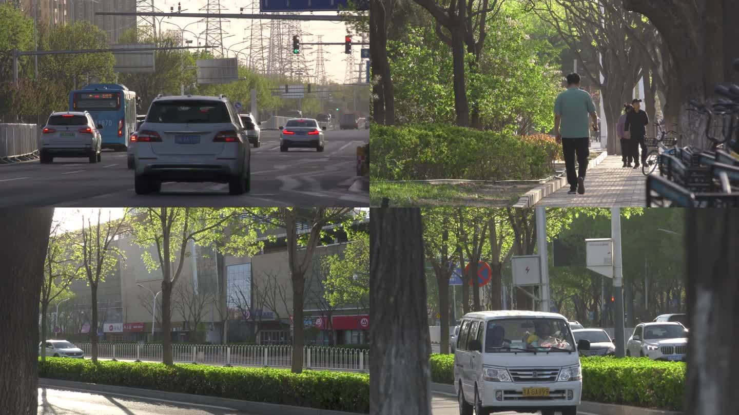 车流人流阳光大道北京城市生活骑行上班忙碌
