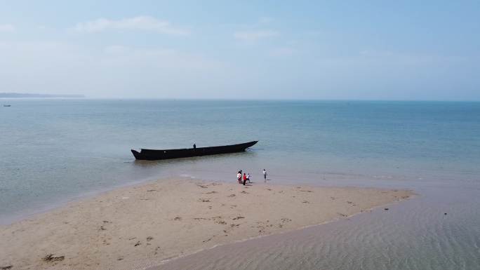 海口航拍标志性建筑雕塑海滩无人空镜日落