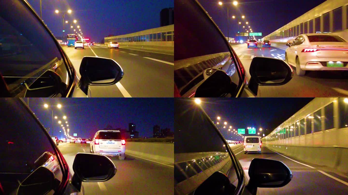 城市夜晚汽车在马路上面奔跑夜景视频素材延