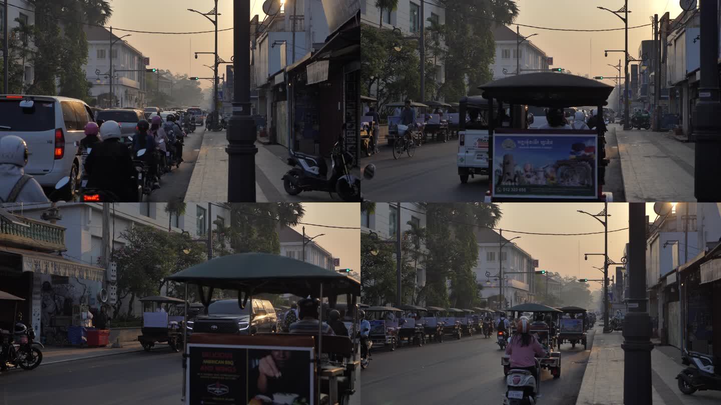 柬埔寨暹粒早晨日出繁忙马路街道车流突突车