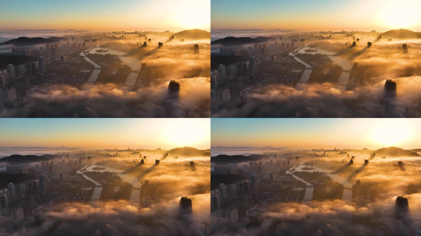 平流雾下城市高楼鸟瞰朝霞4K航拍-1