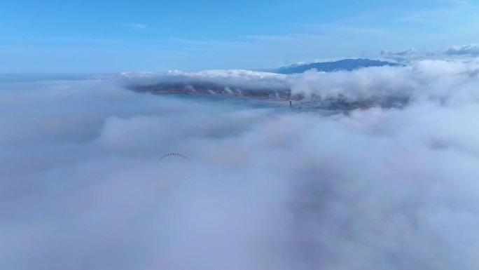 航拍-港中旅海泉湾摩天轮平流雾