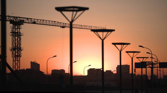 夕阳落日清晨朝阳下城市街道开发建设09