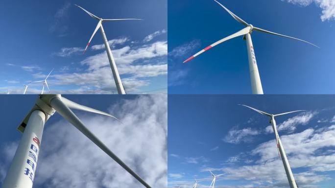 蓝天白云下的风机风车太阳能风力发电新能源