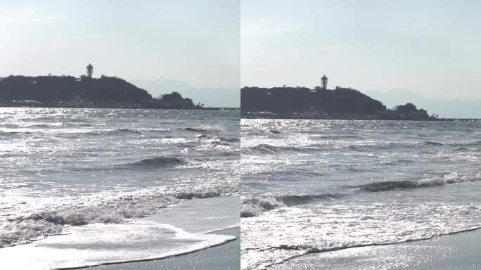 日本镰仓海边，大海拍打沙滩