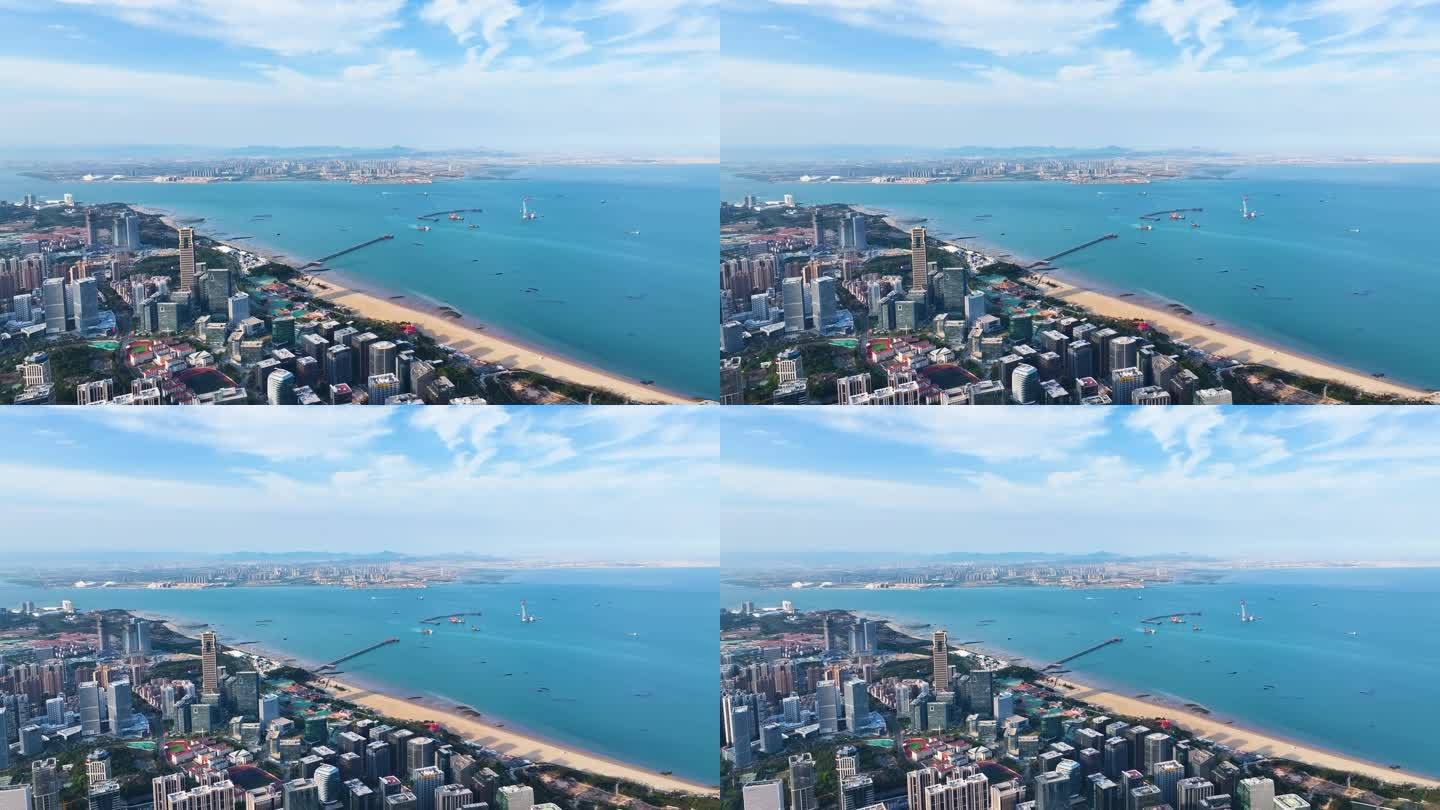 海边城市高楼海面蓝天4K航拍