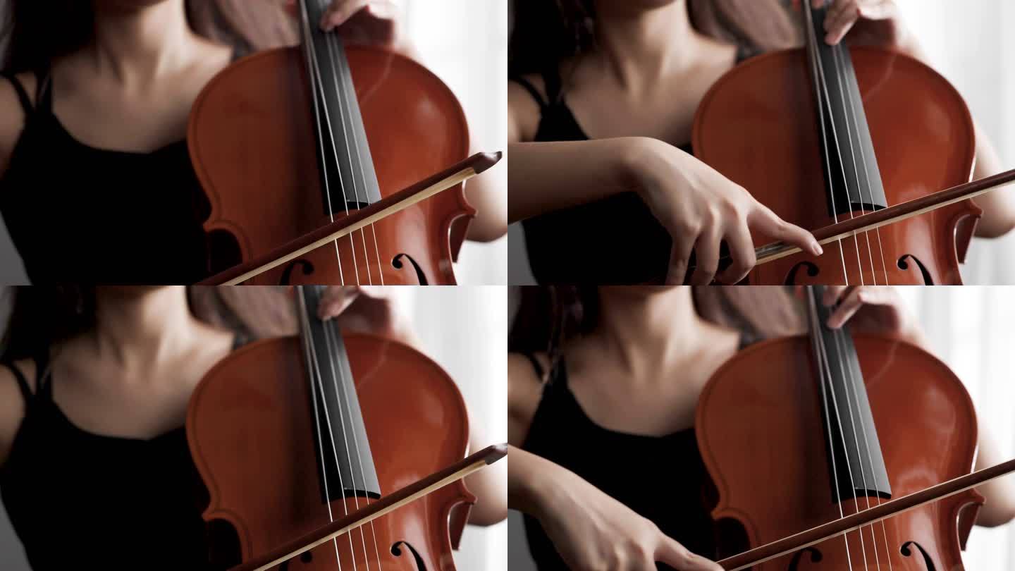 女人演奏大提琴手特写