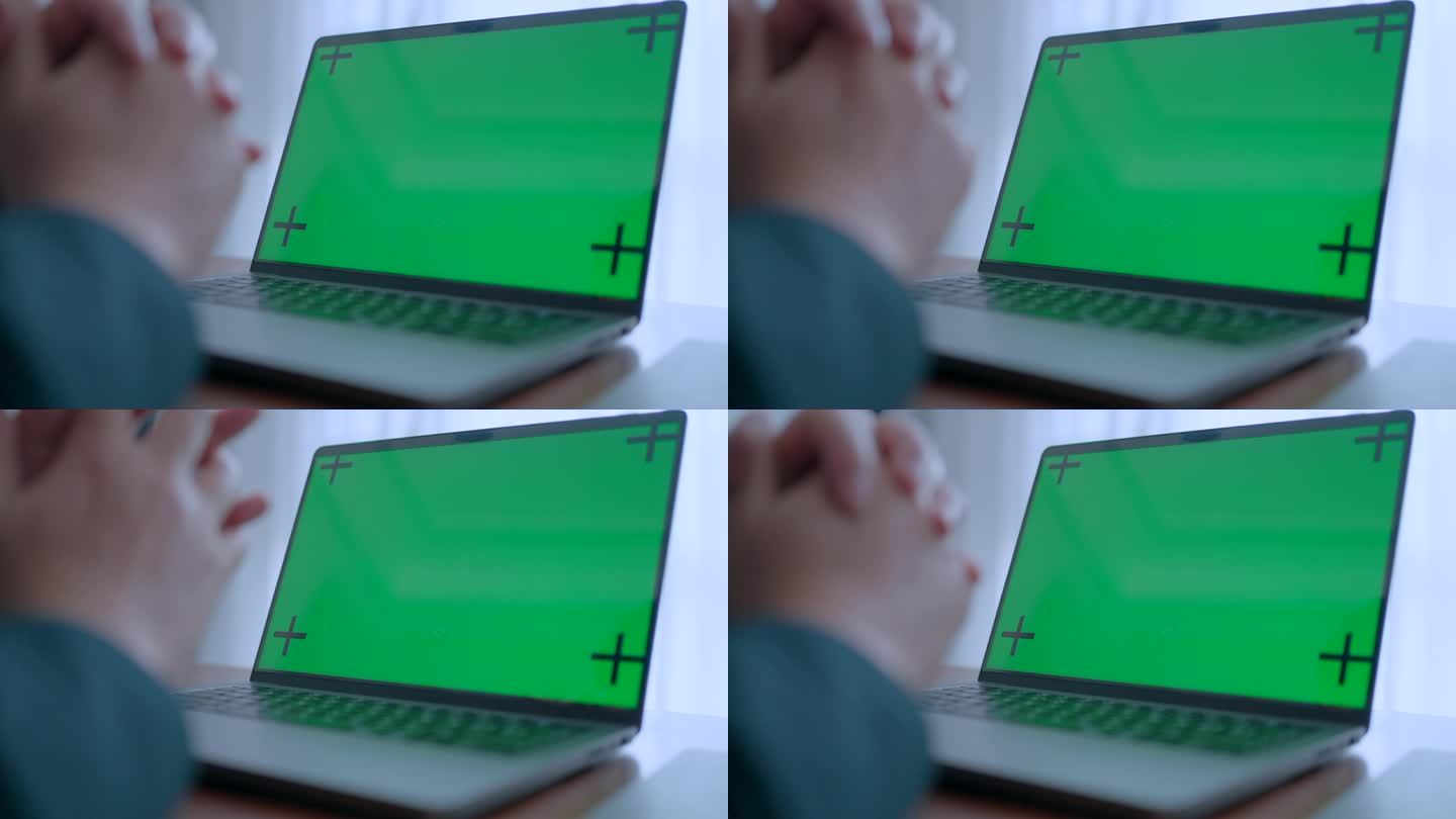 紧张地看着电脑绿屏