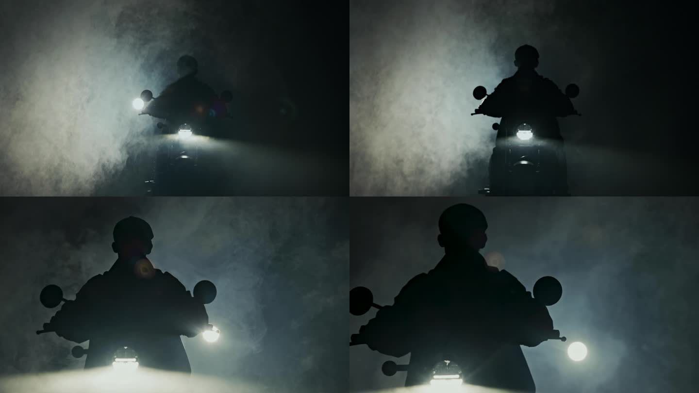 逆光拍摄摩托车从烟雾中出现