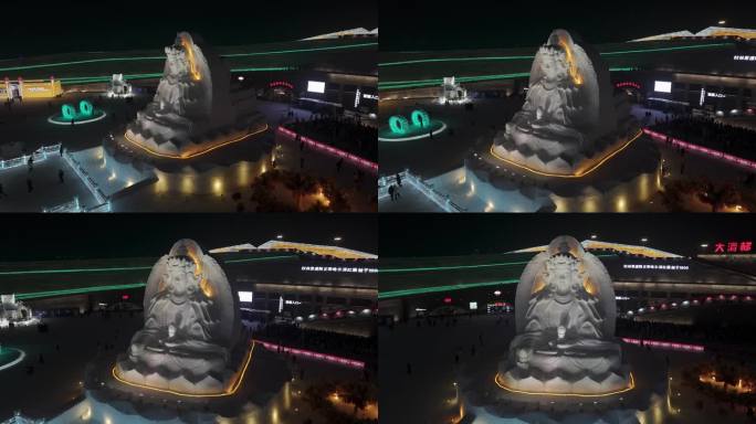 航拍4K哈尔滨冰雪大世界雪雕佛像地藏王菩萨