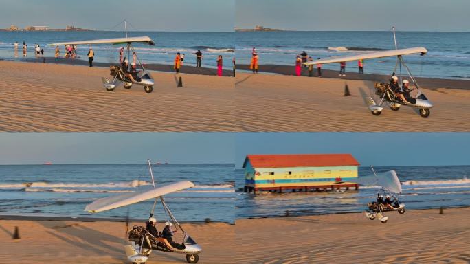 航拍4K傍晚海边海岸沙滩游客乘坐滑翔机游玩
