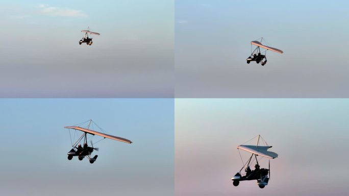 三角动力滑翔机载客空中飞翔
