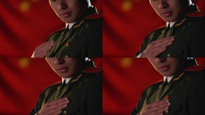 军人面对国旗抚摸军装