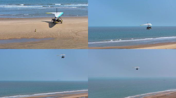 航拍海边沙滩动力三角滑翔机载游客游玩飞翔