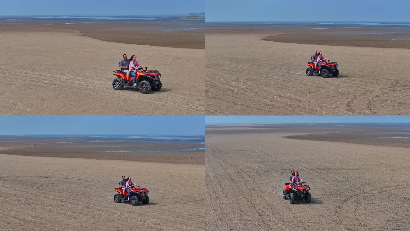 情侣海边沙滩驾驶沙滩摩托