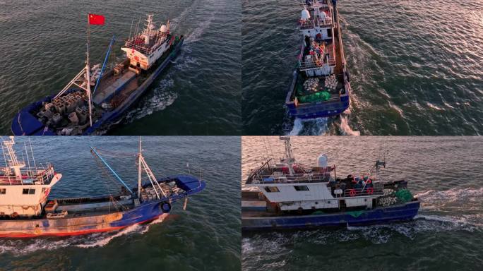 4K航拍带国旗五星红旗的渔船出海