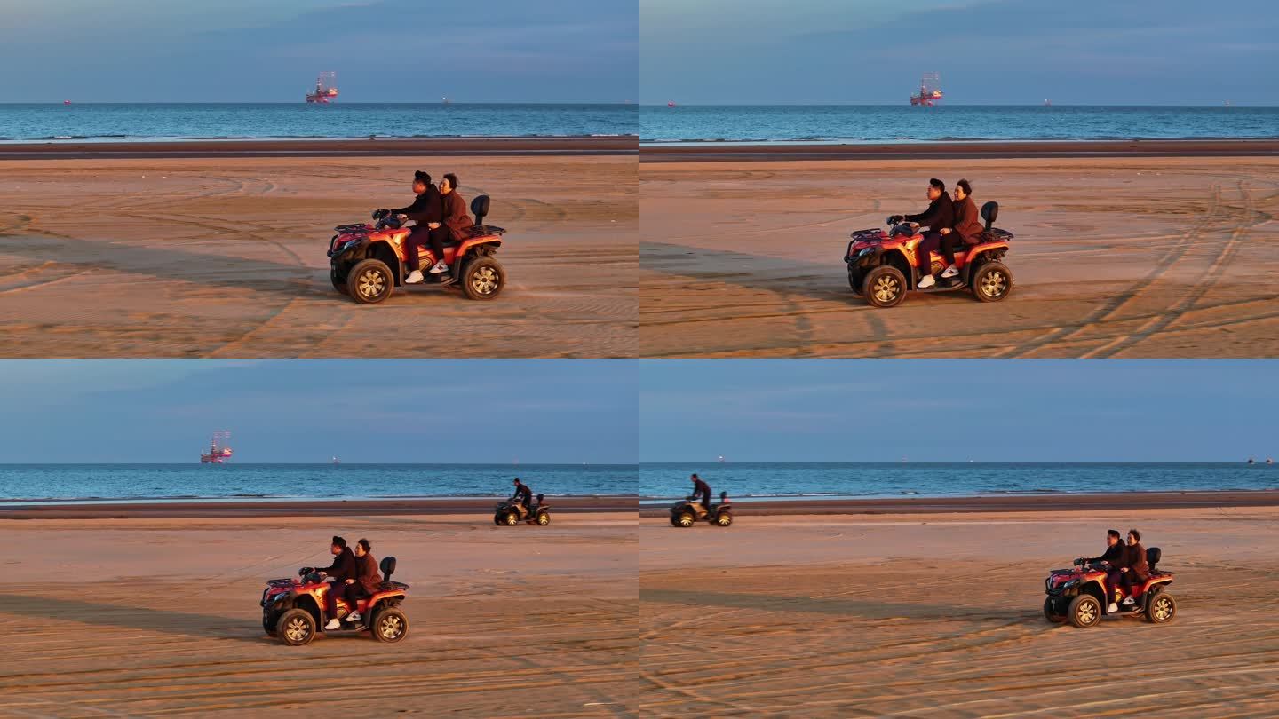 海边沙滩骑沙滩摩托