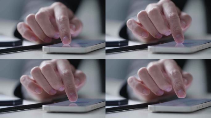 男人手指滑动手机屏幕特写