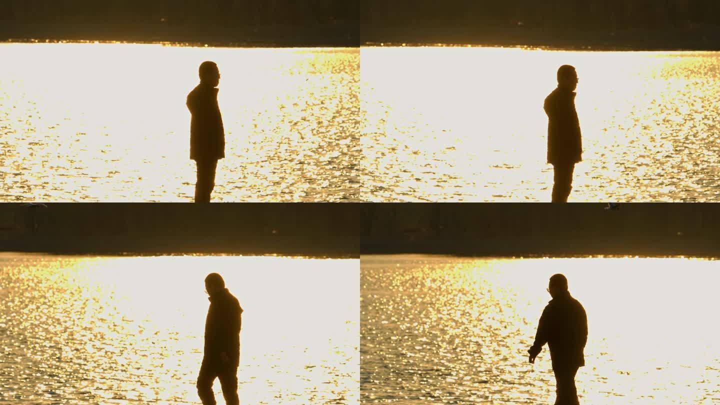 孤独男人海边散步压力大情绪低落忧郁