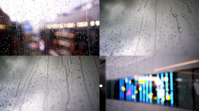 白天下暴雨雨滴落在窗户上