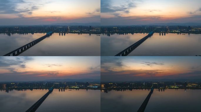 黄昏日落火烧云下的高铁跨江大桥航拍延时