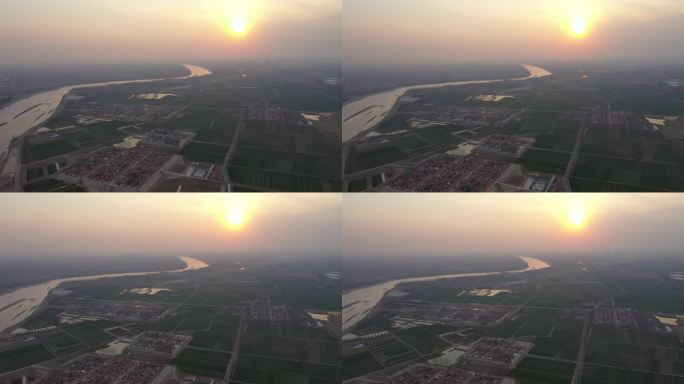 4K航拍电影镜头夕阳落日下的黄河现代村落