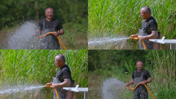 农民微笑浇水灌溉