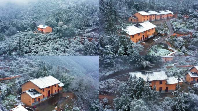 航拍山谷中客家传统村落雪景1