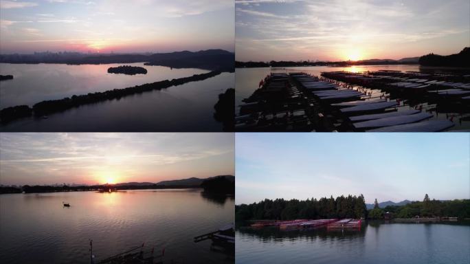 西湖白堤清晨日出摇橹船码头