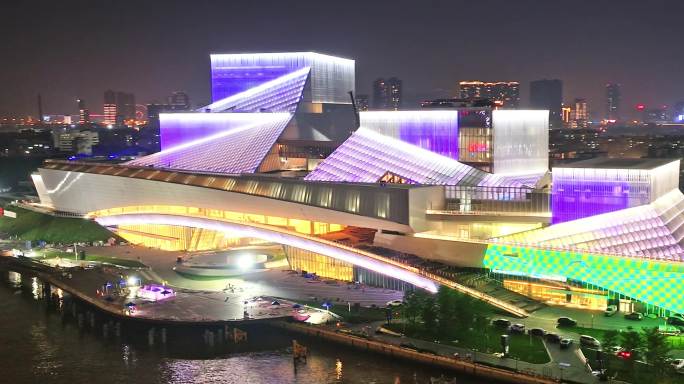 航拍广州大湾区艺术中心亮灯日转夜