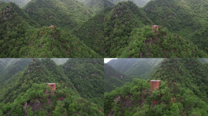 实拍大山顶上的一处无人居住房屋