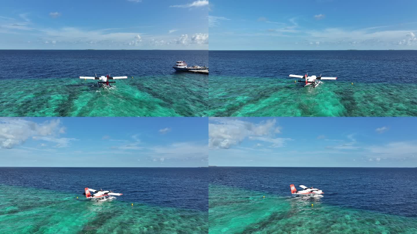 马尔代夫水上飞机的鸟瞰图蓝色海水中起飞